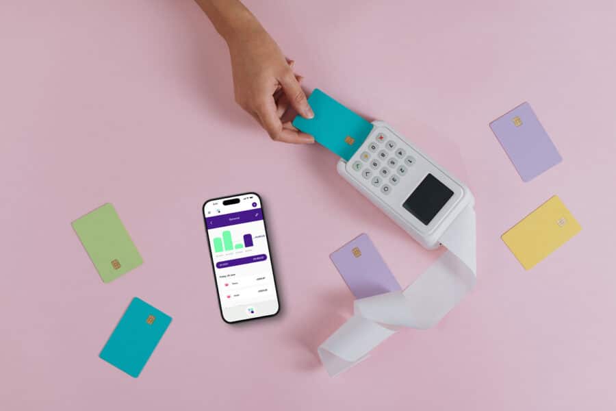 Open Banking app Menna on table with credit cards