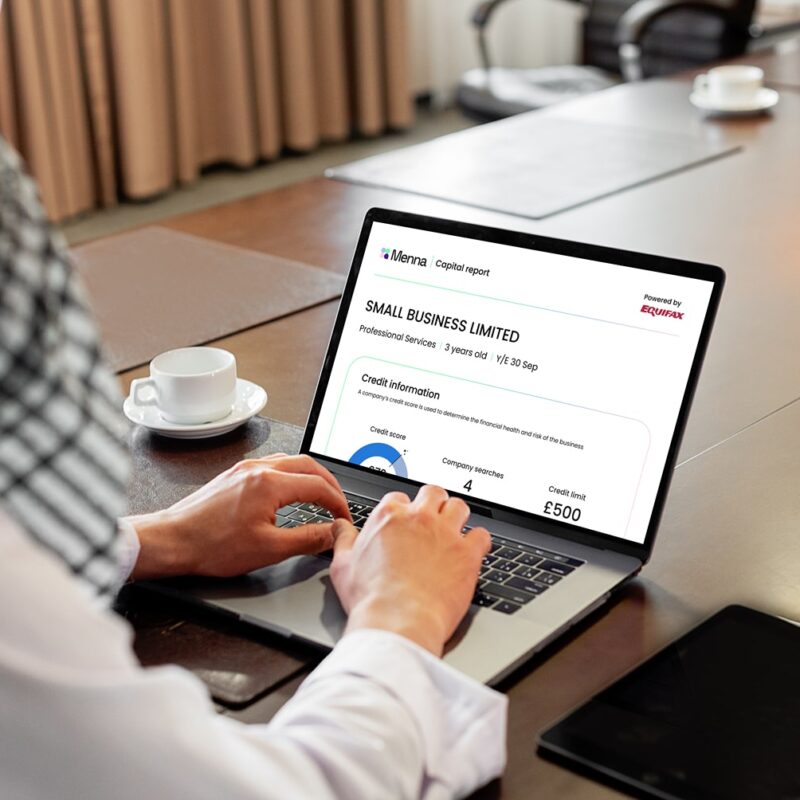 Business owner running business credit checks